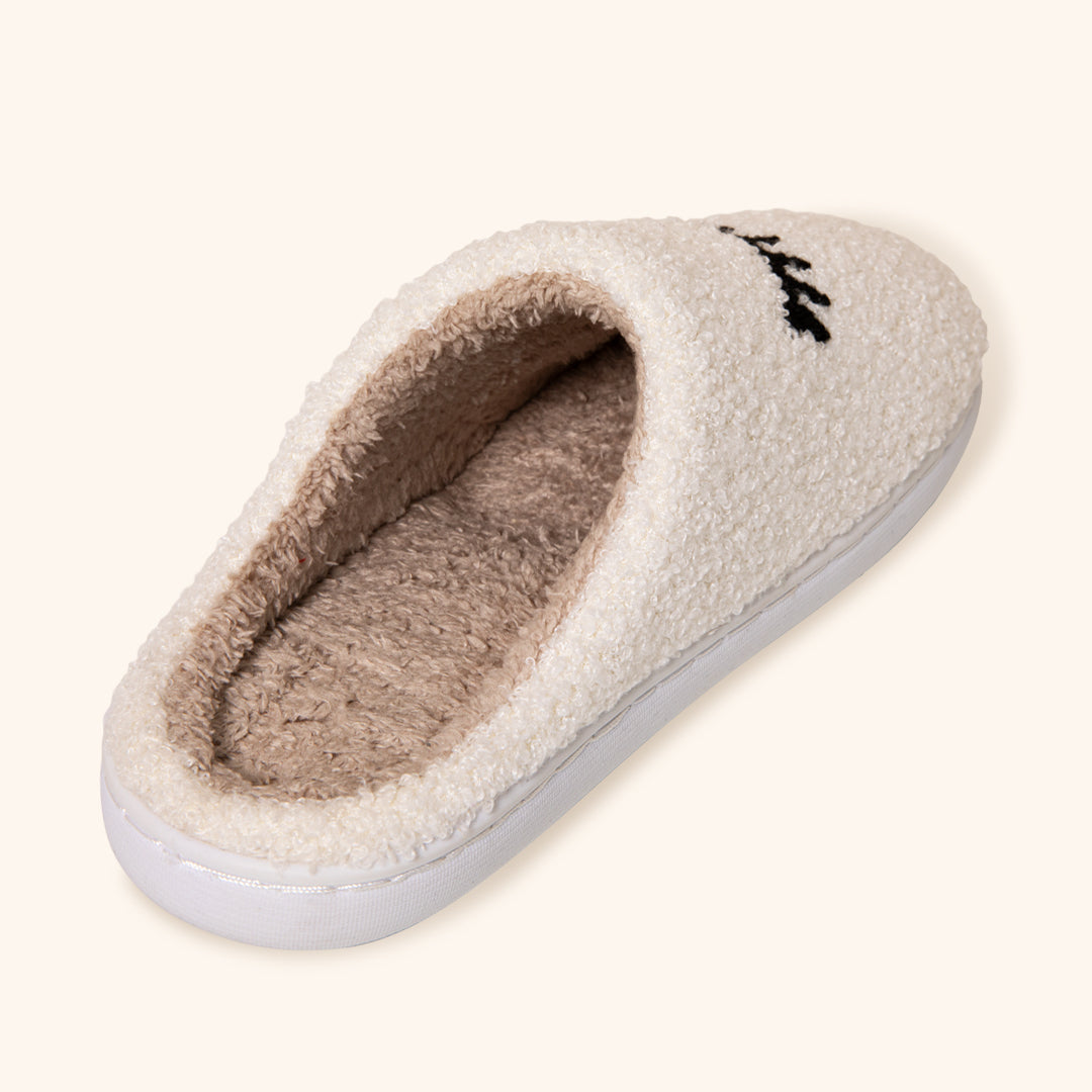 Gezellige teddypantoffels met wimperdesign