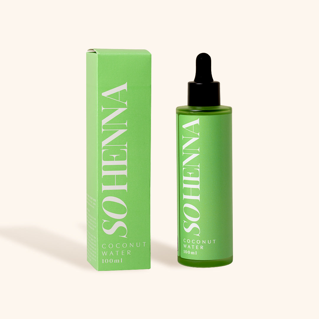 Dus Henna die kokoswater mengt